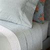 A Cala Sage Organic Sheets bed sheet with a blue and white pattern. (John Robshaw)