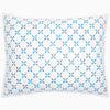 A Layla Azure Quilt pillow by John Robshaw with a blue and white geometric pattern.
