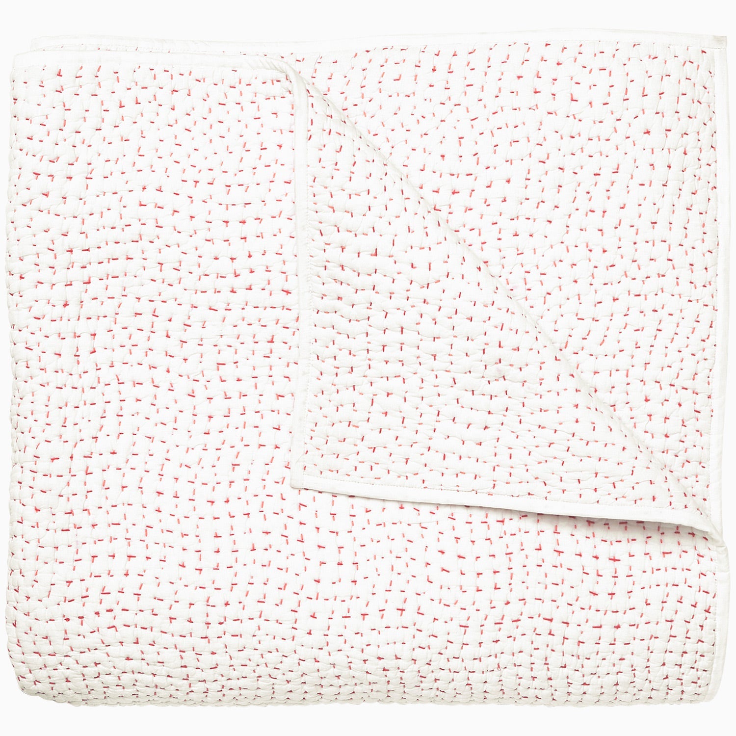 A white and pink Organic Hand Stitched Lotus Quilt with dots, by John Robshaw.