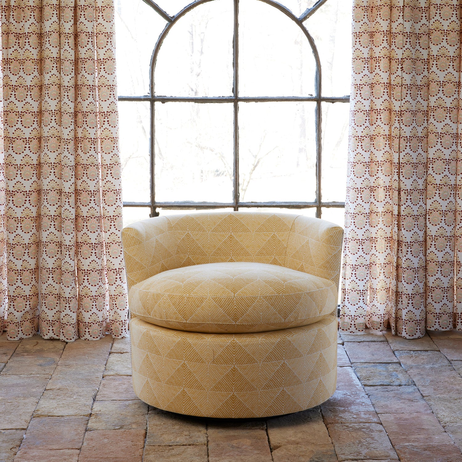 Round Swivel Chair in Farzu Marigold and Bijal Sand