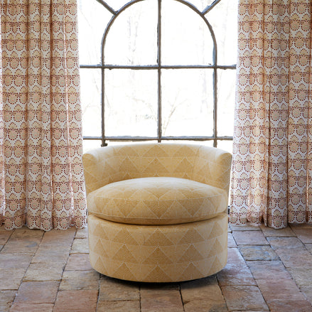 Round Swivel Chair in Farzu Marigold and Bijal Sand by John Robshaw