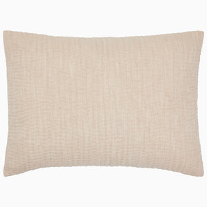 The Vivada Sand Woven Sham by John Robshaw is a rectangular beige pillow sham, featuring a textured, quilted pattern and crafted with soft cotton batting, shown from above on a white background.