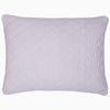 A John Robshaw Nandi Lavender Quilt featuring block printing on a white cotton background.