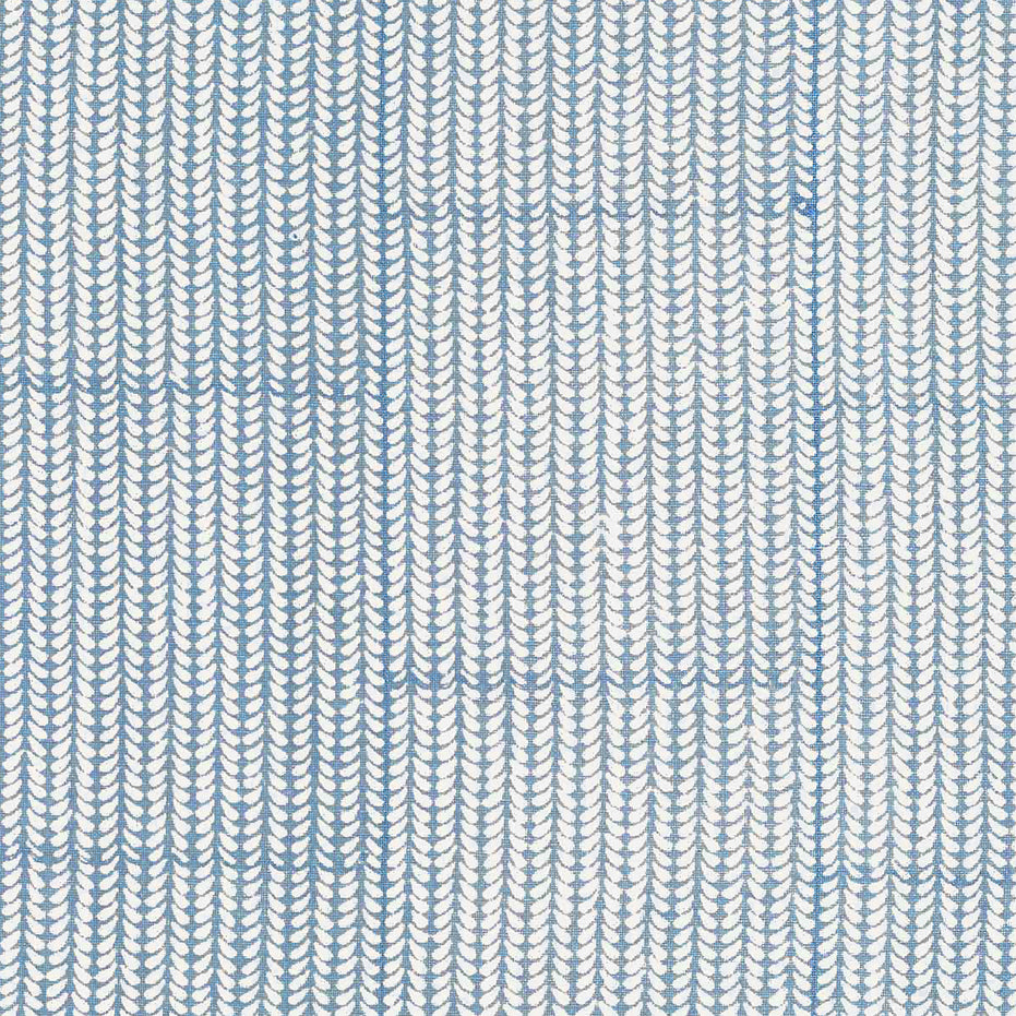 A close up of a beautifully hand block printed John Robshaw Aleppo Light Indigo Fabric showcasing exquisite craftsmanship.