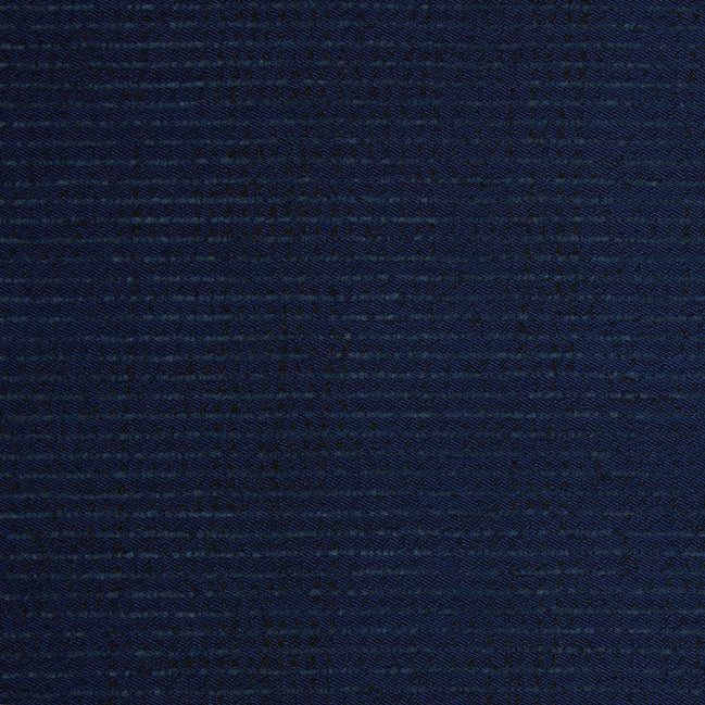 A close up image of a dark blue John Robshaw Bijal Indigo Performance Fabric suitable for indoor and outdoor use.
