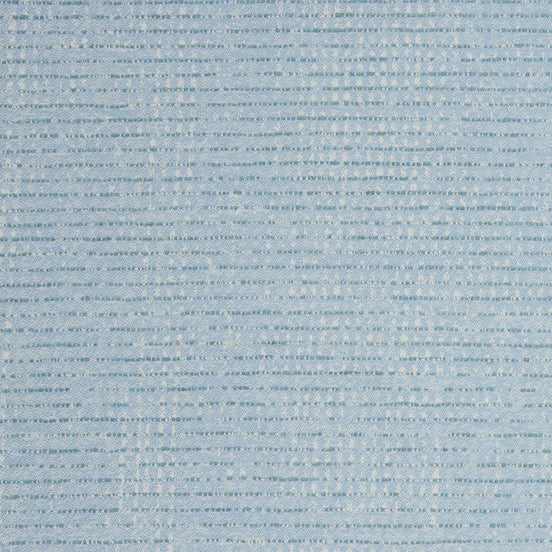 A Bijal Light Indigo Performance Fabric by John Robshaw, with small dots on it, perfect for a luxurious touch to any space.
