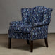 John Robshaw Ashi Azure Woodruff Chair with wooden legs, upholstered in Ashi Azure fabric showcasing a floral block print of light blue flowers and green leaves on a dark blue background.