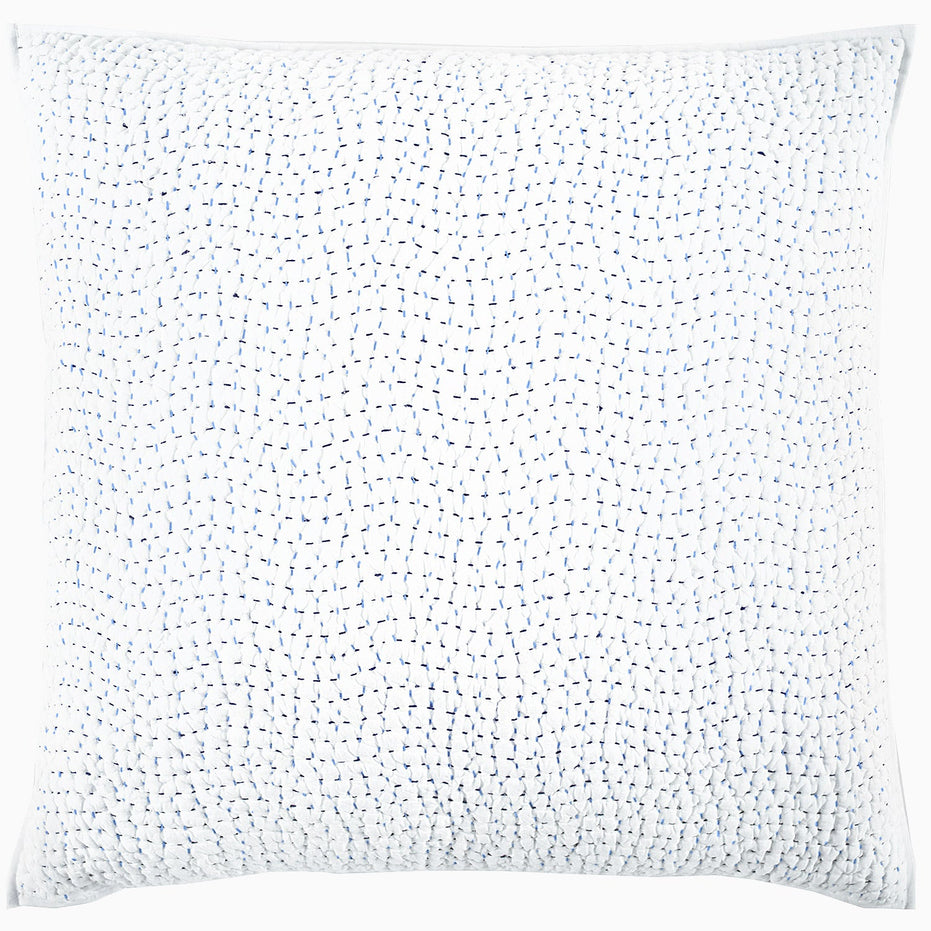 A John Robshaw Organic Hand Stitched Light Indigo Quilt with hand stitching on it.