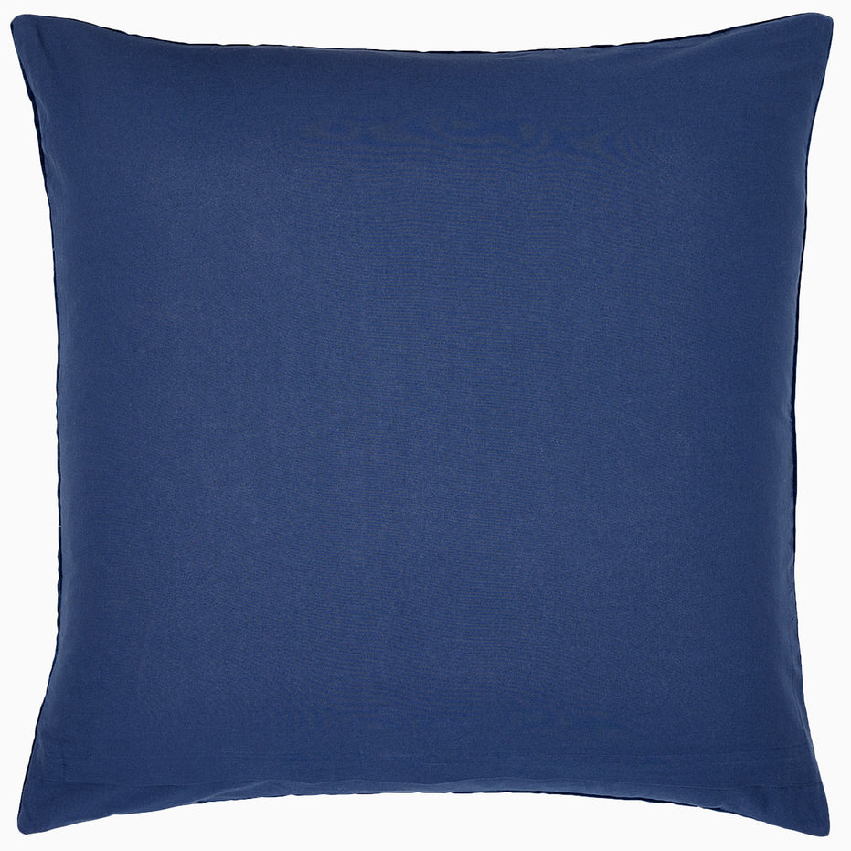 A John Robshaw hand-quilted Velvet Indigo Quilt pillow on a white background, created by Indian artisans.