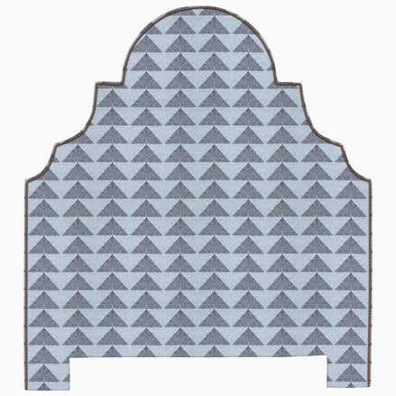 A Custom Dara Headboard with a geometric pattern in blue and gray available for shipping by John Robshaw.