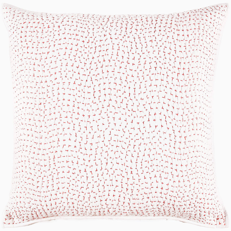 A pink and white Organic Hand Stitched Lotus Quilt with John Robshaw organic cotton cover and hand stitching.