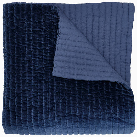 A John Robshaw Velvet Indigo Quilt.