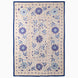 John Robshaw Open Water Suzani blanket, a rectangular vintage piece with blue floral and vine embroidery on a light background framed by a solid indigo fabric border.