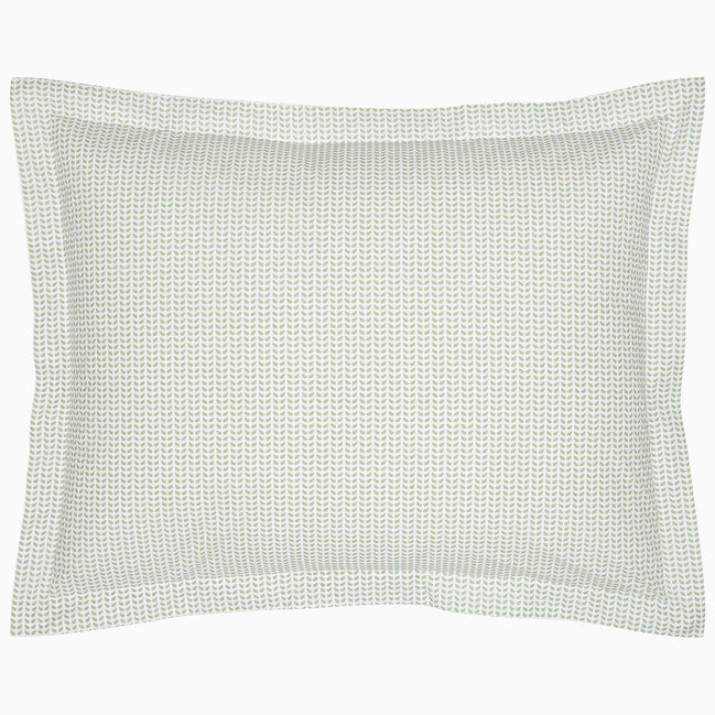 A John Robshaw Cinde Sage Organic Duvet with a green polka dot pillowcase on a white background.