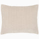 A soft beige Velvet Sand Quilt pillow on a white background, hand quilted by John Robshaw.