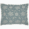 The John Robshaw Kimari Mist Coverlet showcases a blue background adorned with delicate woven florals, crafted from soft jacquard cotton chenille and finished with scalloped edges.