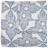 Folded John Robshaw's Dasati Lapis Quilt, featuring a blue and gray geometric leaf pattern, crafted from cotton voile.