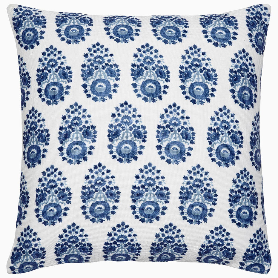 A small Adira Indigo Outdoor Decorative Pillow with a floral pattern of bhuti flowers by John Robshaw.