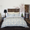 A Dasati Duvet Set by John Robshaw with a blue and white floral pattern made of cotton.