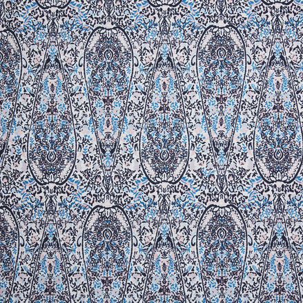 A John Robshaw Ishya Indigo Fabric in a blue and white paisley print.