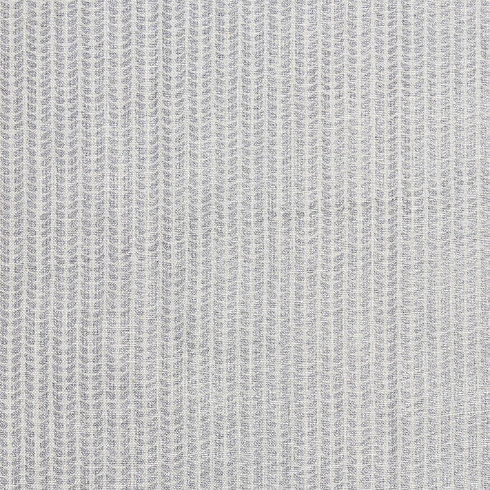 A close up image of a hand block printed John Robshaw Aleppo Silver Fabric skillfully created by artisans.
