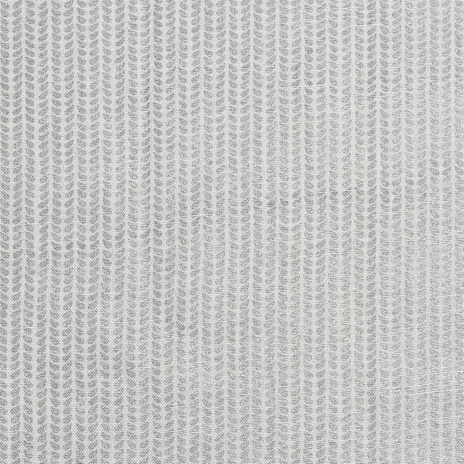 A close up image of a hand block printed John Robshaw Aleppo Silver Fabric skillfully created by artisans.