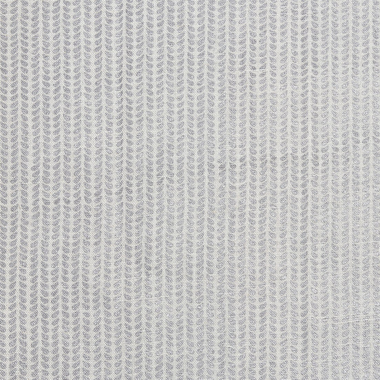 A close up image of a hand block printed John Robshaw Aleppo Silver Fabric skillfully created by artisans.