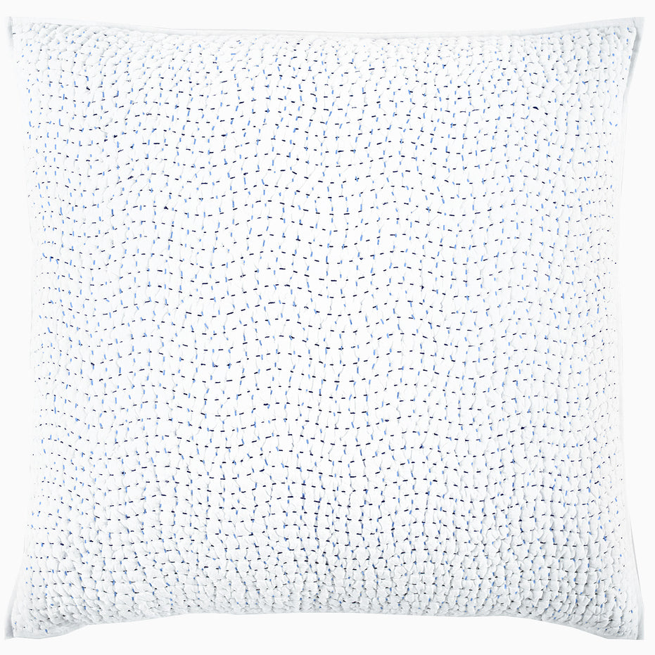 A John Robshaw Organic Hand Stitched Light Indigo Quilt with hand stitching on it.