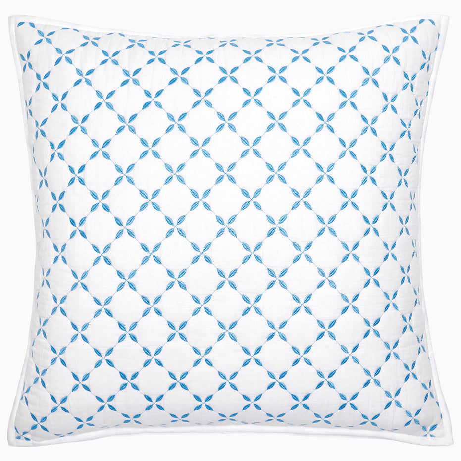 A Layla Azure Quilt by John Robshaw, with a geometric pattern made of cotton voile.