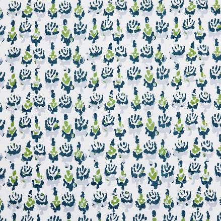 A John Robshaw Kiki Peacock Fabric-inspired, blue and green cactus print.