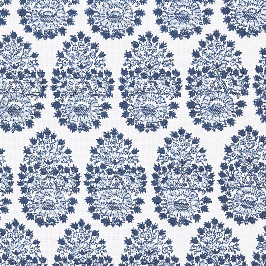 A blue and white paisley pattern on a white background featuring block prints, the Lanka Azure Performance Fabric by John Robshaw.