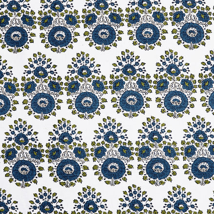 A blue and green floral pattern featuring traditional craftsmanship of the Lanka Peacock Fabric by John Robshaw.