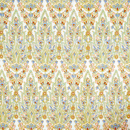 A blue and yellow paisley pattern inspired by Mughal gardens, hand block printed with traditional craftsmanship, the Marmar Seaglass Fabric by John Robshaw.