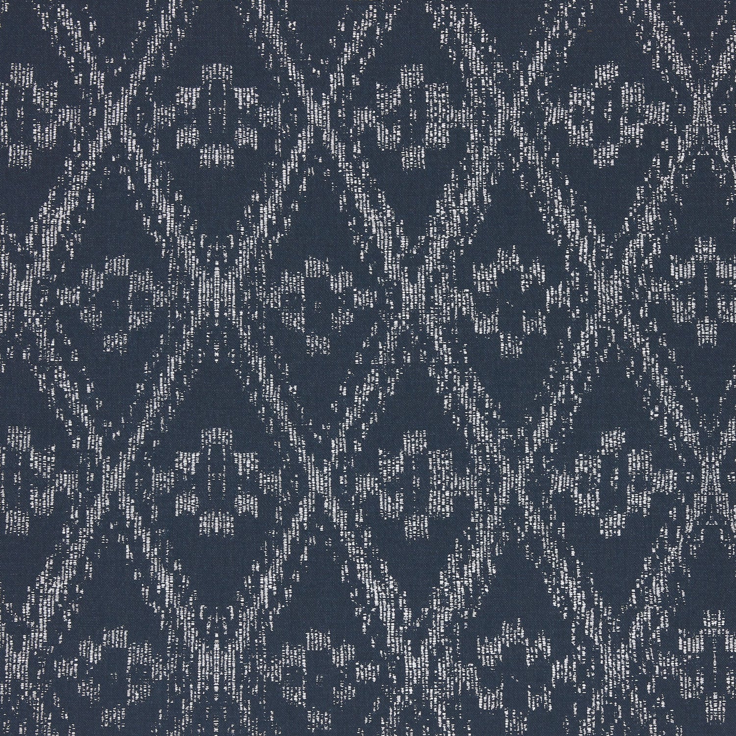A blue and white Ramati Azure Performance Fabric with a diamond pattern, inspired by Thai ikats, by John Robshaw.