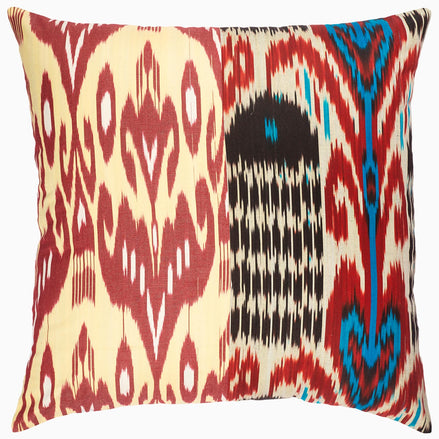 A Red Dark Combo Ikat pillow with a Thai ikat pattern from John Robshaw.