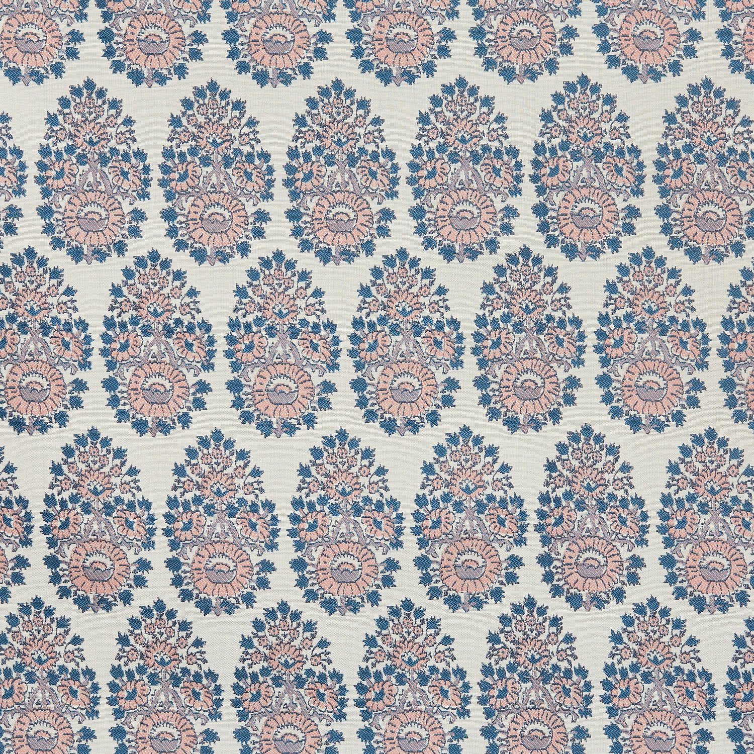 A blue and pink paisley pattern on a white background that showcases the Lanka Primrose Performance Fabric by John Robshaw, which highlights fabric-making traditions.