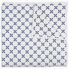 A blue and white Layla Indigo Quilt blanket with a cross design by John Robshaw.
