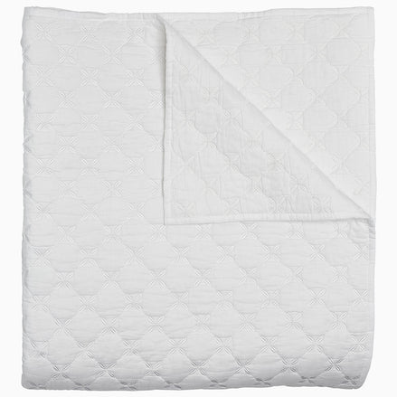 A Layla White Quilt by John Robshaw.