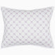 A Layla Lavender Quilt pillow with a cross design, made from cotton voile, by John Robshaw.