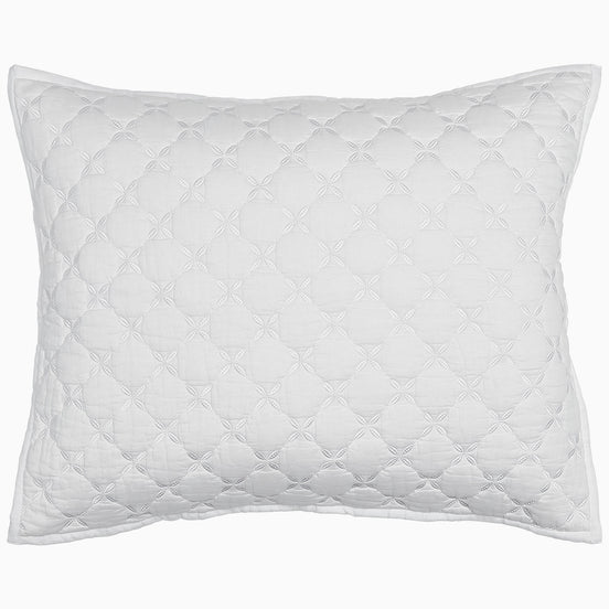 A John Robshaw Layla White Quilt on a cotton voile background.