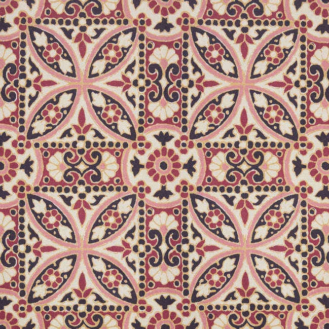 A pink and black Oman Berry Fabric tile with a floral design, featuring a block print pattern by John Robshaw.