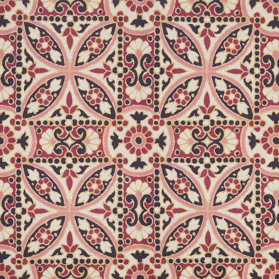 A pink and black Oman Berry Fabric tile with a floral design, featuring a block print pattern by John Robshaw.