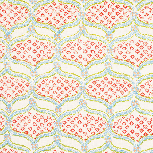 A pink and blue floral pattern on a white background, created using Hasati Lotus Fabric by skilled artisans from John Robshaw.