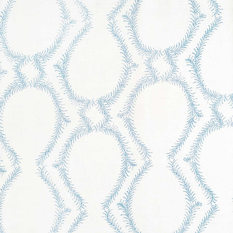 A blue and white pattern inspired by traditional craftsmanship creates a stunning design, using the Aerial Light Indigo Fabric by John Robshaw.
