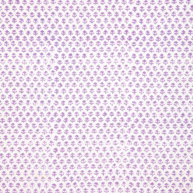 A Bindi Lavender Fabric with a purple and white polka dot pattern on a white background featuring traditional craftsmanship by John Robshaw.
