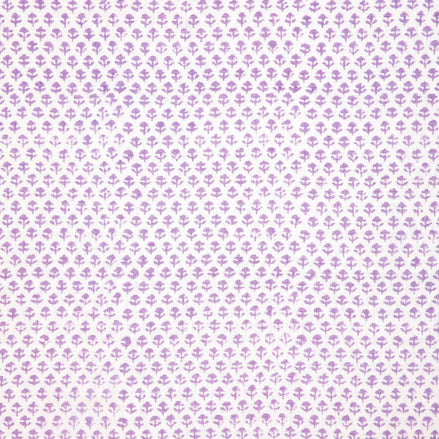 A Bindi Lavender Fabric with a purple and white polka dot pattern featuring traditional craftsmanship by John Robshaw.