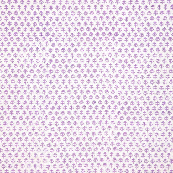 A Bindi Lavender Fabric with a purple and white polka dot pattern on a white background featuring traditional craftsmanship by John Robshaw.