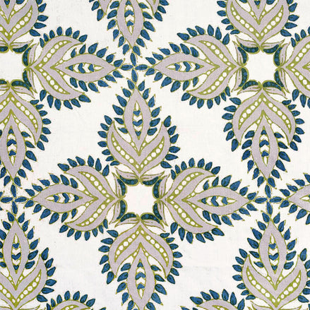 A Diba Peacock Fabric by John Robshaw, hand block printed with a blue and green floral pattern, featuring a protective symbol known as nazar.