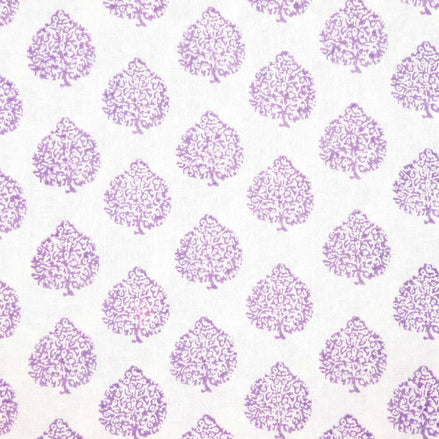 A purple and white Mali Lavender Fabric with trees on it, showcasing skilled artisans' traditional craftsmanship from John Robshaw.